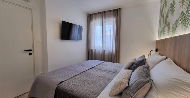 Appartamento Punta Silo A5 – piscina e vista mare