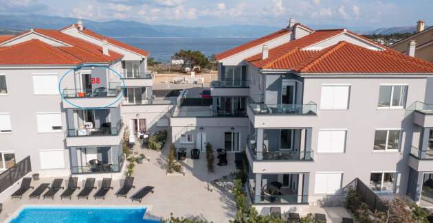 Appartamento Punta Silo B8 – piscina e vista mare