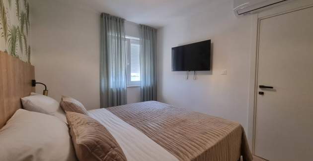 Appartamento Punta Silo B8 – piscina e vista mare